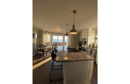 Athens Casa | Enjoy this SPECTACULAR VIEW of Lake Wheeler from our beautiful 4 bedroom home!