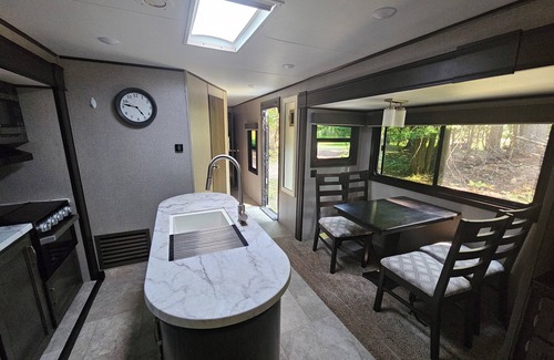 Clark Fork Casa | Enjoyable RV with AC, heat, water, in charming Clark Fork. Pet friendly.