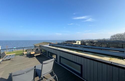 Enkhuizen Casa | Enkhuizer Strand Cube Elite Hafenpanorama mit Dachterrasse Haus Nr 339