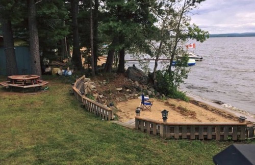 Golden Lake Casa | Entire four bedroom home with private beach and Lake Access