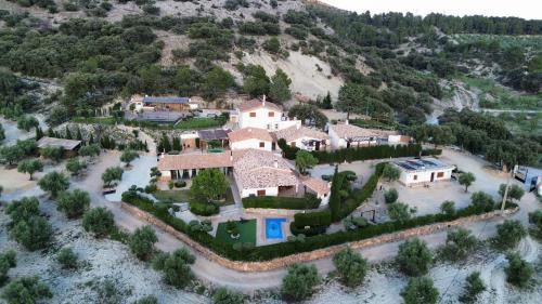 Campocamara Casa | ENTRESIERRAS Apartamentos rurales piscina 24h con barbacoa y espacio para eventos