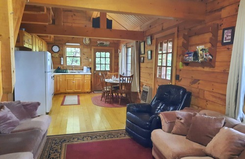 Willimantic Cabina | Escape to Howie's Camp: Unwind and Recharge at This Lakefront Log Cabin