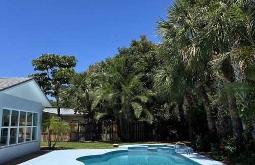 South Patrick Shores Casa | Escape to Paradise! Stunning Poolside Haven Just Moments from the Shore.