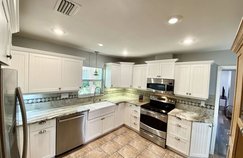 Tarpon Springs Casa | Escape to Paradise: Luxe Waterfront 3BR/3BA w/Pool, Hot Tub & Fishing Dock