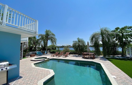 Tarpon Springs Casa | Escape to Paradise: Luxe Waterfront 3BR/3BA w/Pool, Hot Tub & Fishing Dock