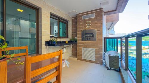Praia Grande Casa | Espaçoso Apto 2 Quartos com PISCINA, VISTA MAR e Churrasqueira- PERFEITO PARA FAMÍLIA na PRAIA DOS ANJOS RESIDENCE CLUB
