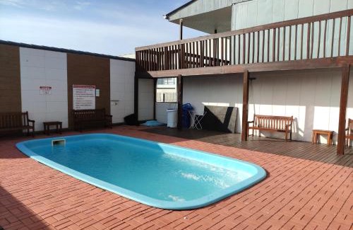 Porto Belo Apartamento | Estúdio e Suítes com Piscina, churrasqueira, AR Split, WIFI - 6x sem juros no cartão