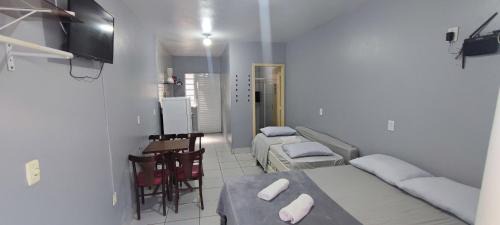 Castelo Branco Apartamento | Estúdios Individual na Meia Praia ar, wifi, vaga, cozinha, tv smart - 6 x no cartão sem juros
