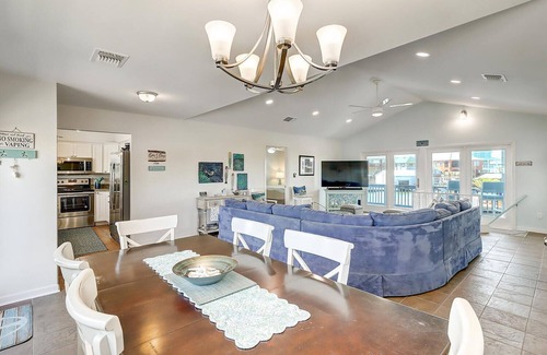 City-by-the Sea Casa | Estes Oasis! Canal front home with private lighted dock! Views! Foosball game