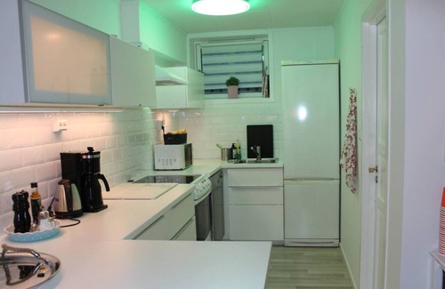 Lund Casa | Et Koselig og Sentralt Townhouse med en Idyllisk Lille Hage for 2-5 Pers