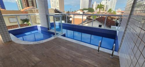 Balneario Paqueta Apartamento | Excelente Apto com piscina 200 mts da praia - QX10H