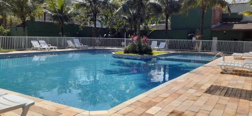 Juquehy Casa | Excelente casa em condomínio fechado em Juquehy. 2 suítes, ar, piscina comum.
