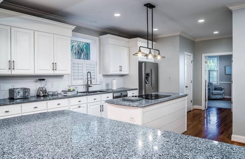 Isle of Palms Casa | Exclusive 5K sq ft Home w/Backyard Oasis & Salt Water Heated Pool, Steps 2 Beach