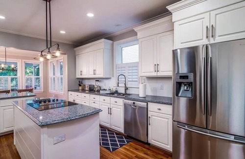 Isle of Palms Casa | Exclusive 5K sq ft Home w/Backyard Oasis & Salt Water Heated Pool, Steps 2 Beach