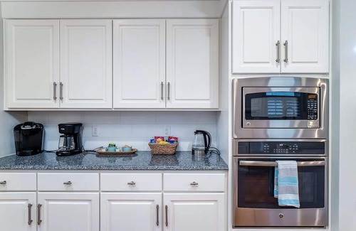 Isle of Palms Casa | Exclusive 5K sq ft Home w/Backyard Oasis & Salt Water Heated Pool, Steps 2 Beach