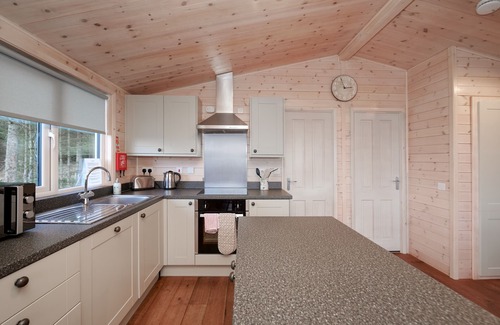 Forres Cabina | Elegantes, privadas y impresionantes vistas desde la bañera de hidromasaje