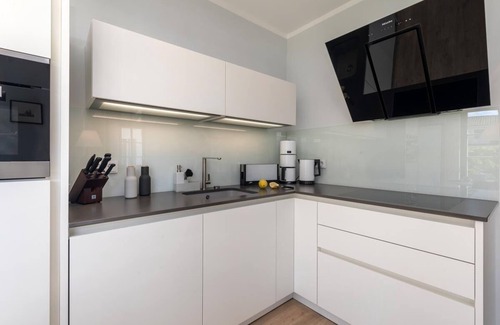 Zingst Apartamento | Exclusivo apartamento en una ubicación central con jardín, chimenea, WiFi, Sky, PS4, FIFA20, karaoke