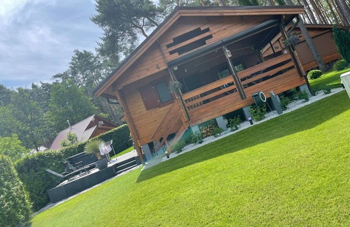 Lubrza Casa | Exclusive Lakefront Vacation Home - Beach, Jacuzzi, Boat