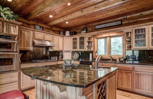 Hayward Casa | Executive Custom Log Lodge on Little Round Lake