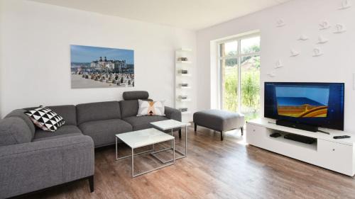 Lobbe Casa | Exklusive Reetdach-Villa Ostseefrische