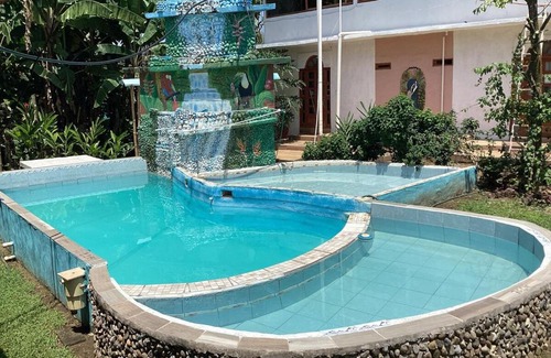 Tuxtla Chico Casa | Exotic flower cabin pool