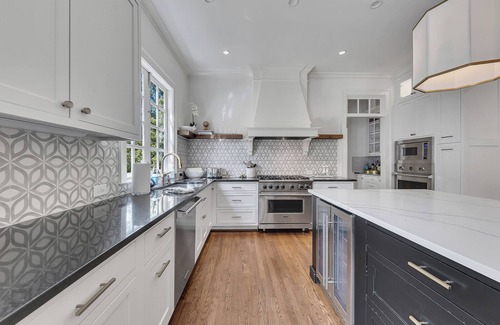North Buckhead Casa | Expansive 5BR/7BA home in Buckhead, just 9.8 miles from Mercedes-Benz Stadium. Features a chef’s kitchen, in-law suite, ensuite baths, basement lounge, office, gym, and screened patio. Ideal for families, groups, or traveling fans.