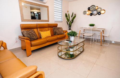 Bucana Casa | Expansive Paradise with Private Jacuzzi and Tropical Patio