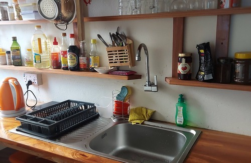 Osu Apartamento | Experience a homey stay at a serene-serviced guest room in Osu, Ghana.