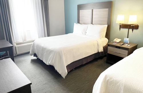 West Kissimmee Hotel | Experience The Magic of Orlando- 2 Rooms W/ Free Shuttle, 5 Pools, and Breakfast