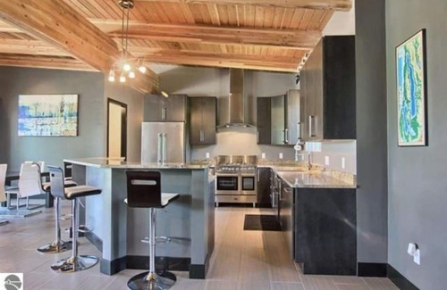 Rapid City Casa | EXPERIENCE TORCH LAKE -TORCH RIVER AMAZING CONTEMP. ESCAPE “TRACE” -DOCK, HOTTUB