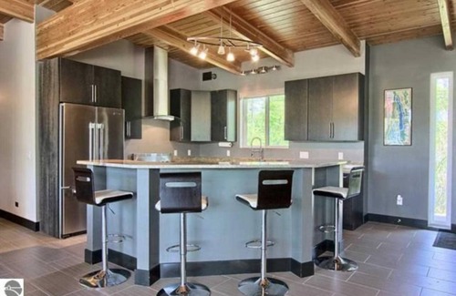 Rapid City Casa | EXPERIENCE TORCH LAKE -TORCH RIVER AMAZING CONTEMP. ESCAPE “TRACE” -DOCK, HOTTUB