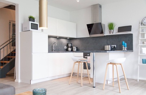 Dornum Apartamento | "Experience unforgettable vacation days in nature at Gulfhof Polder72!"