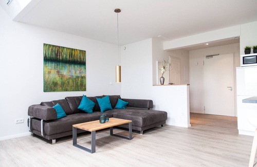 Dornum Apartamento | "Experience unforgettable vacation days in nature at Gulfhof Polder72!"