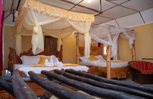 Maasai Mara Hotel | Explore Sand River Lodge
