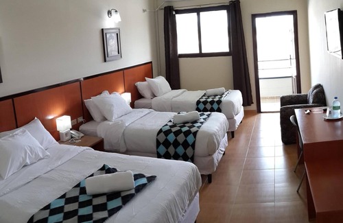 Las Lajas Hotel | Express Inn Coronado Hotel & Camping