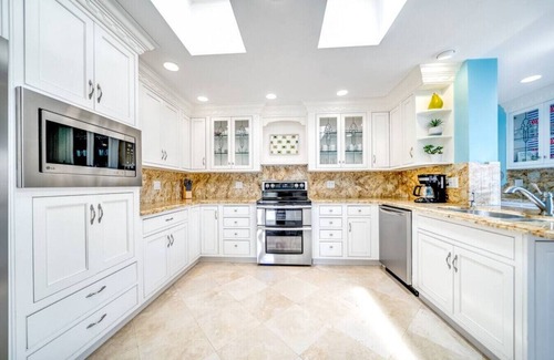 Cypress Lakes Casa | EXQUISITE HEATED POOL+WATERFRONT! 1 MILE TO BEACH!
