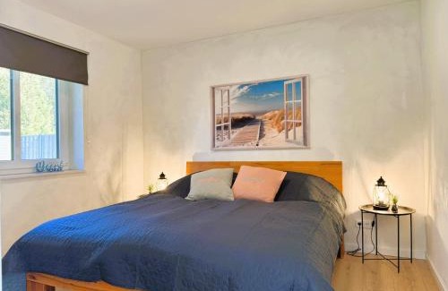 Grundhof Casa | Fördezauber - Ruhiges Ferienhaus mit eingezäuntem Garten und Kamin