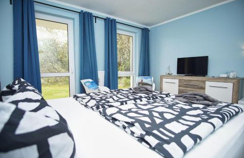 Lobbe Hotel | F-1010 Strandhaus Mönchgut Bed&Breakfast DZ 25 Garten, strandnah, inkl Frühstück