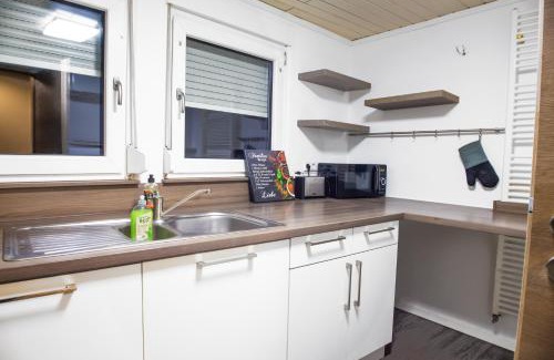 Ilsfeld Apartamento | F&F Suites Ilsfeld DG, zentrale Lage, Autobahnnähe & kostenfreie Privatparkplätze