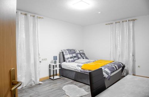 Ilsfeld Apartamento | F&F Suites Ilsfeld OG, zentrale Lage, Autobahnnähe & kostenfreie Privatparkplätze