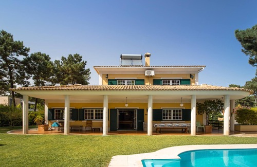 Charneca de Caparica e Sobreda Villa | Villa Aroeira Golf para familias con piscina, jardín, aire acondicionado y Wi-Fi