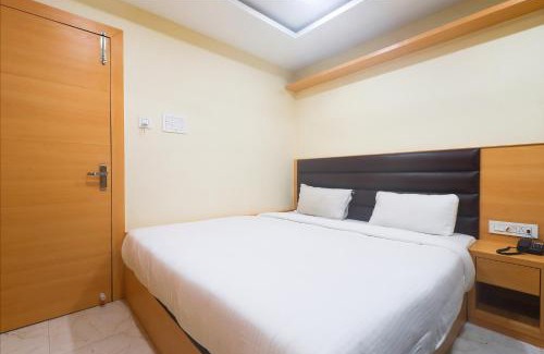 Siliguri Hotel | FabExpress Ganpati 2 - Nr Siliguri Junction
