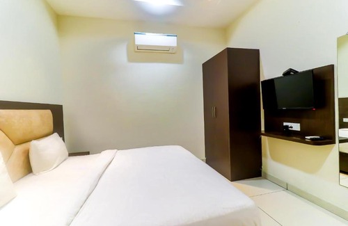 Zirakpur Hotel | FabHotel Nido Residency - Fully Vaccinated Staff