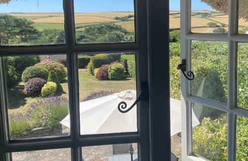 Malborough Cabaña | Fabulous cottage near Salcombe with views, pet-friendly and secluded garden