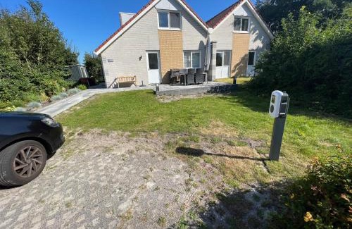 Makkum Casa | familienfreundliches Ferienhaus mit Ruderboot, Sauna und Kamin sowie E-Ladestation