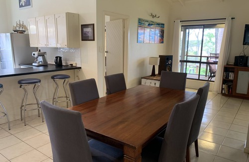 Brisbane Waterfront Casa | Family and Pet Friendly Peaceful Island Waterfront Home With Bikes and Kayaks