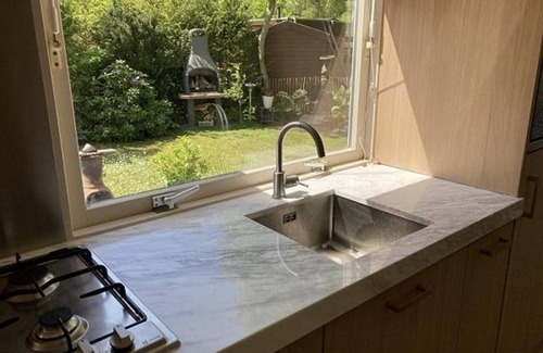 Sint Maartensvlotbrug Casa | Family-friendly chalet with use of park pool.