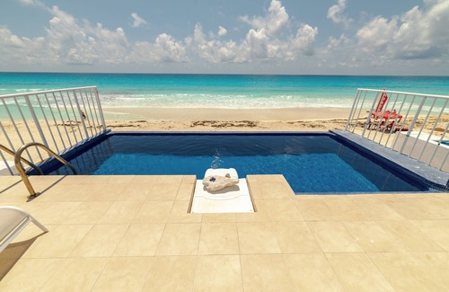 Zona Hotelera Villa | Casa junto a la playa con piscina privada climatizada