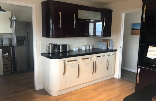 Dornoch Casa | Family Home with stunning beach and mountain views.