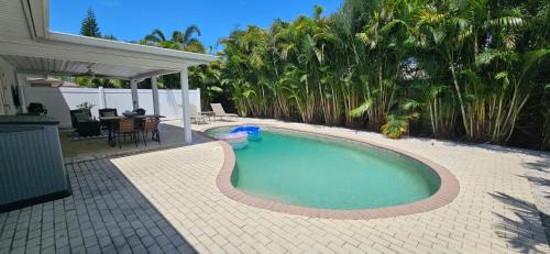 Central Naples Villa | Family Pool Home Close to Naples' Best Beaches